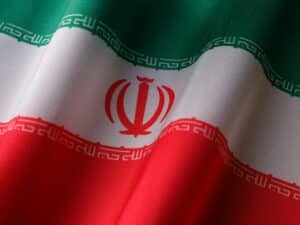 High-quality image of the Iranian national flag waving to symbolize patriotism and national pride.