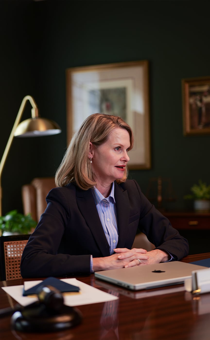 Elizabeth Franklin-Best, Founder & Principal Attorney at Elizabeth Franklin-Best P.C., at her desk.